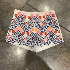 white patterned shorts